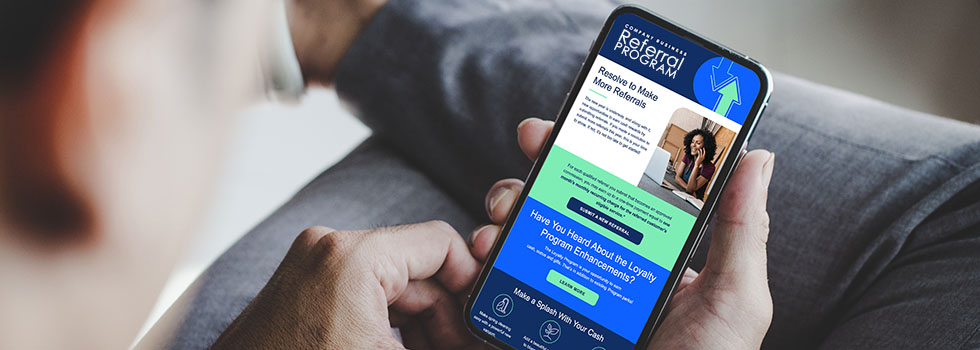 man viewing telecom company channel incentive platform on iphone